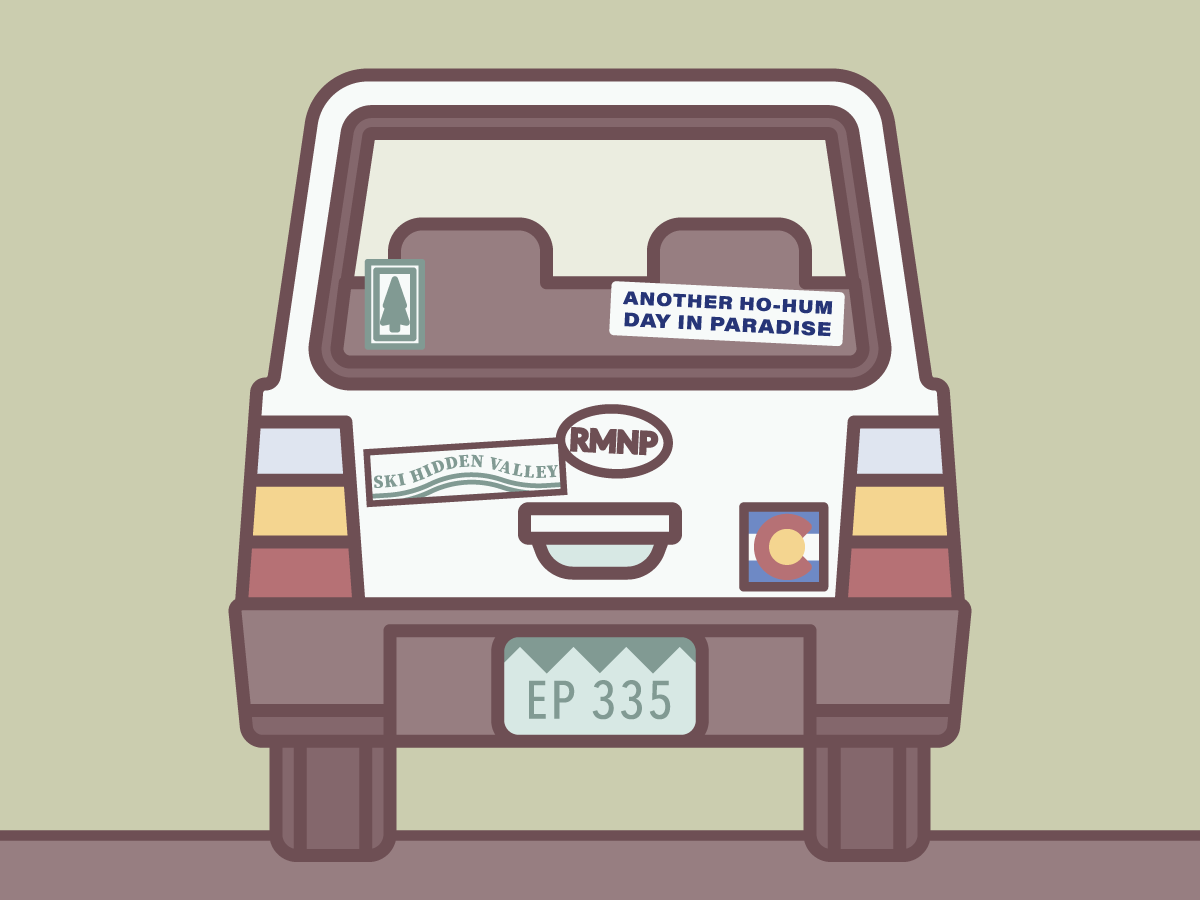 Rear view of a subaru forester with stickers: RMNP, Ski Hidden Valley, Colorado state flag, and Another ho-hum day in paradise. License plate EP 335.
